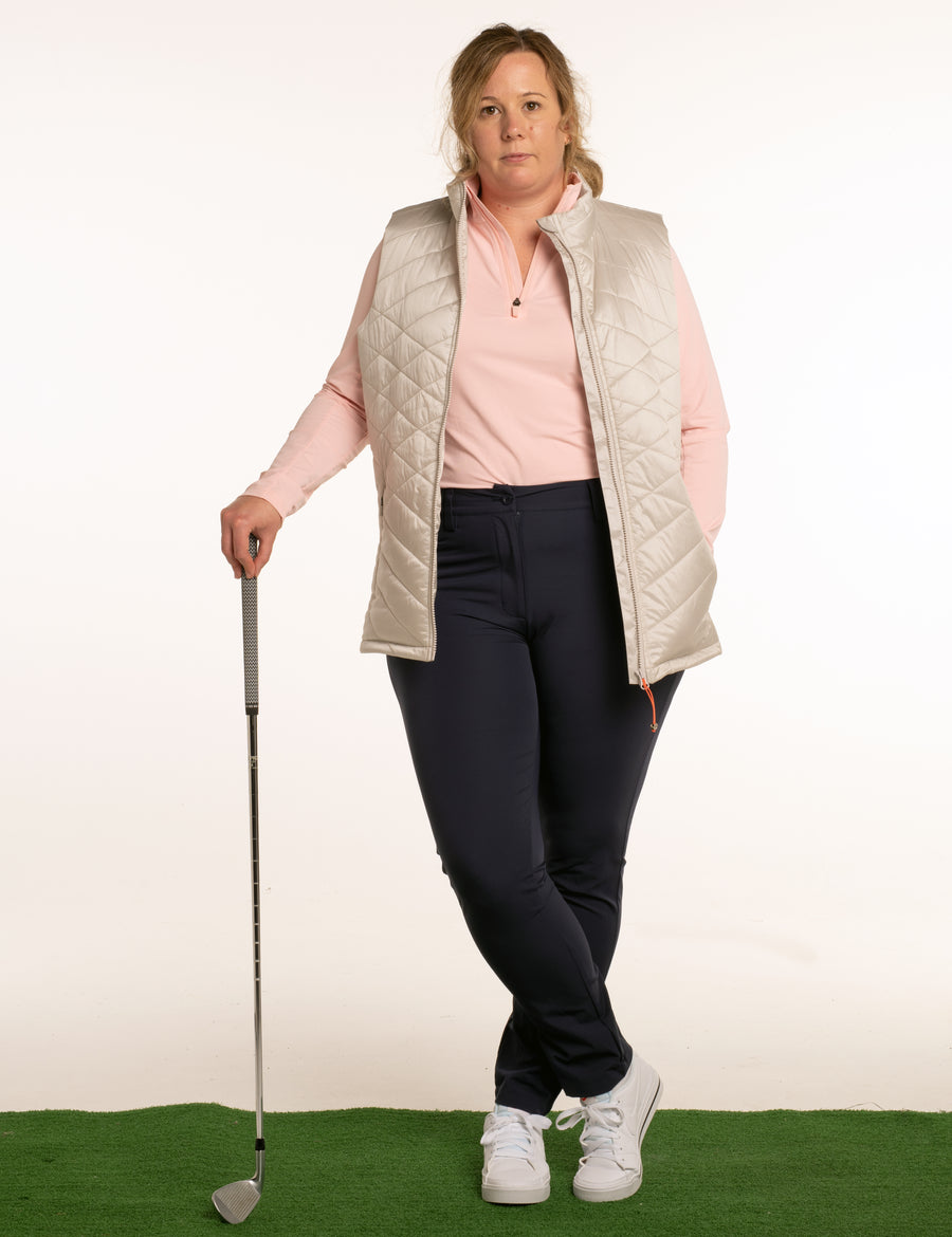 Women's stone golf gilet. Lightweight material, zip up with pockets. 